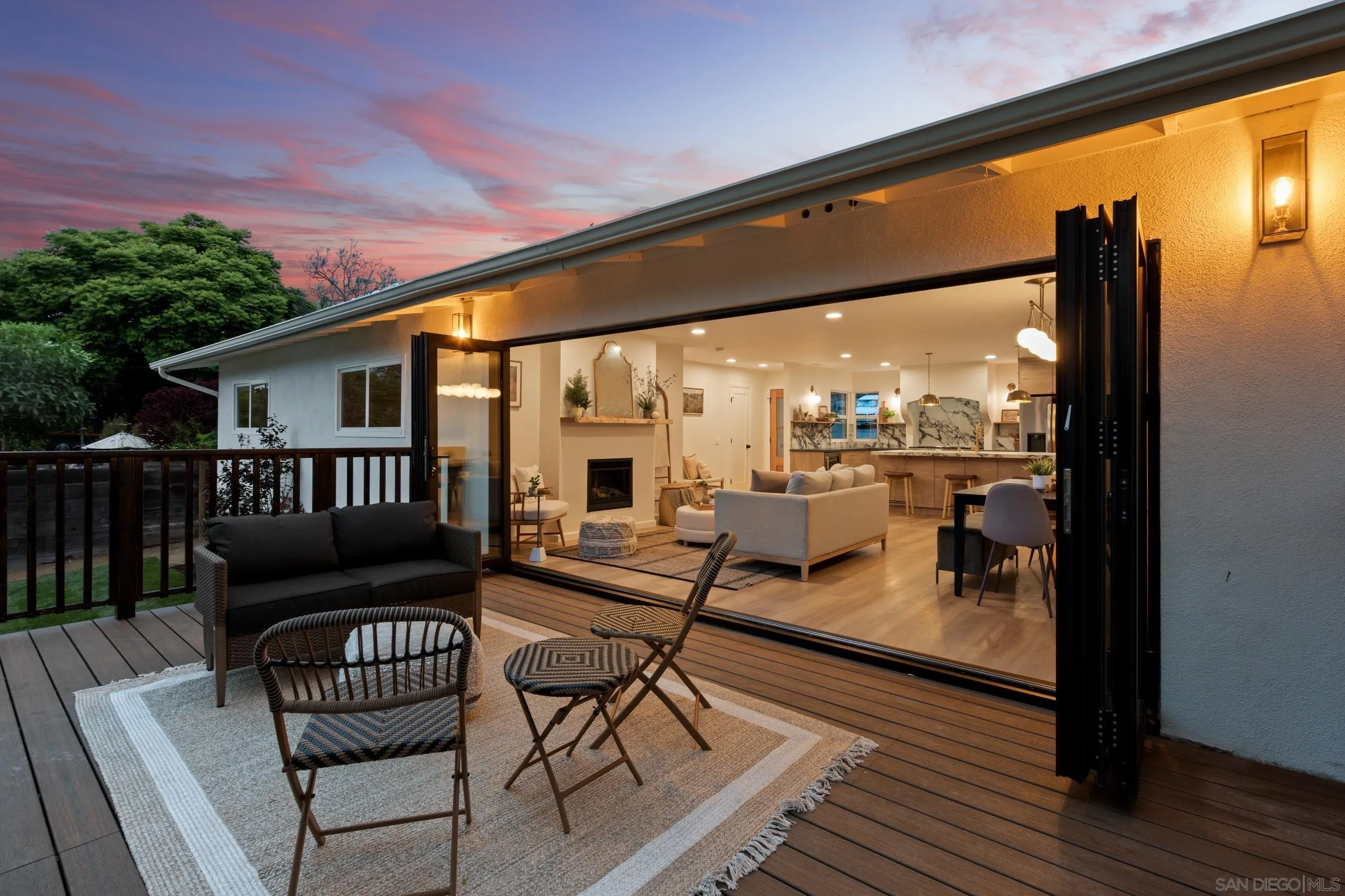 1144 Stratford Drive Encinitas, CA 92024 - Photo 1 of 39 a living room with furniture and a floor to ceiling window