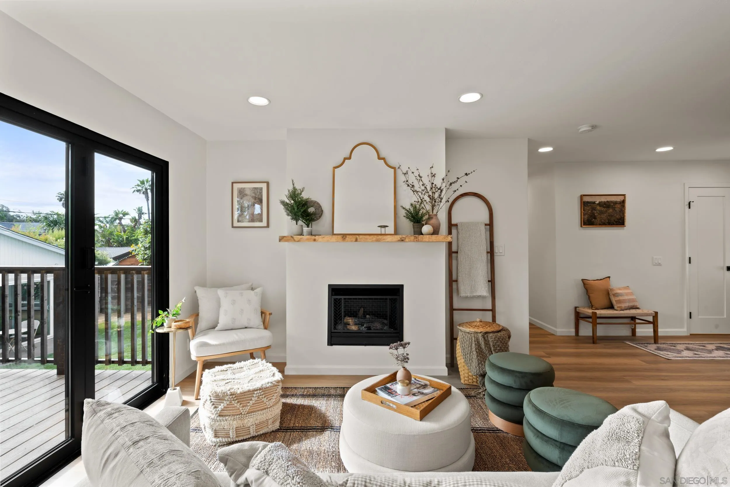 1144 Stratford Drive Encinitas, CA 92024 - Photo 13 of 39 a living room with furniture and a fireplace