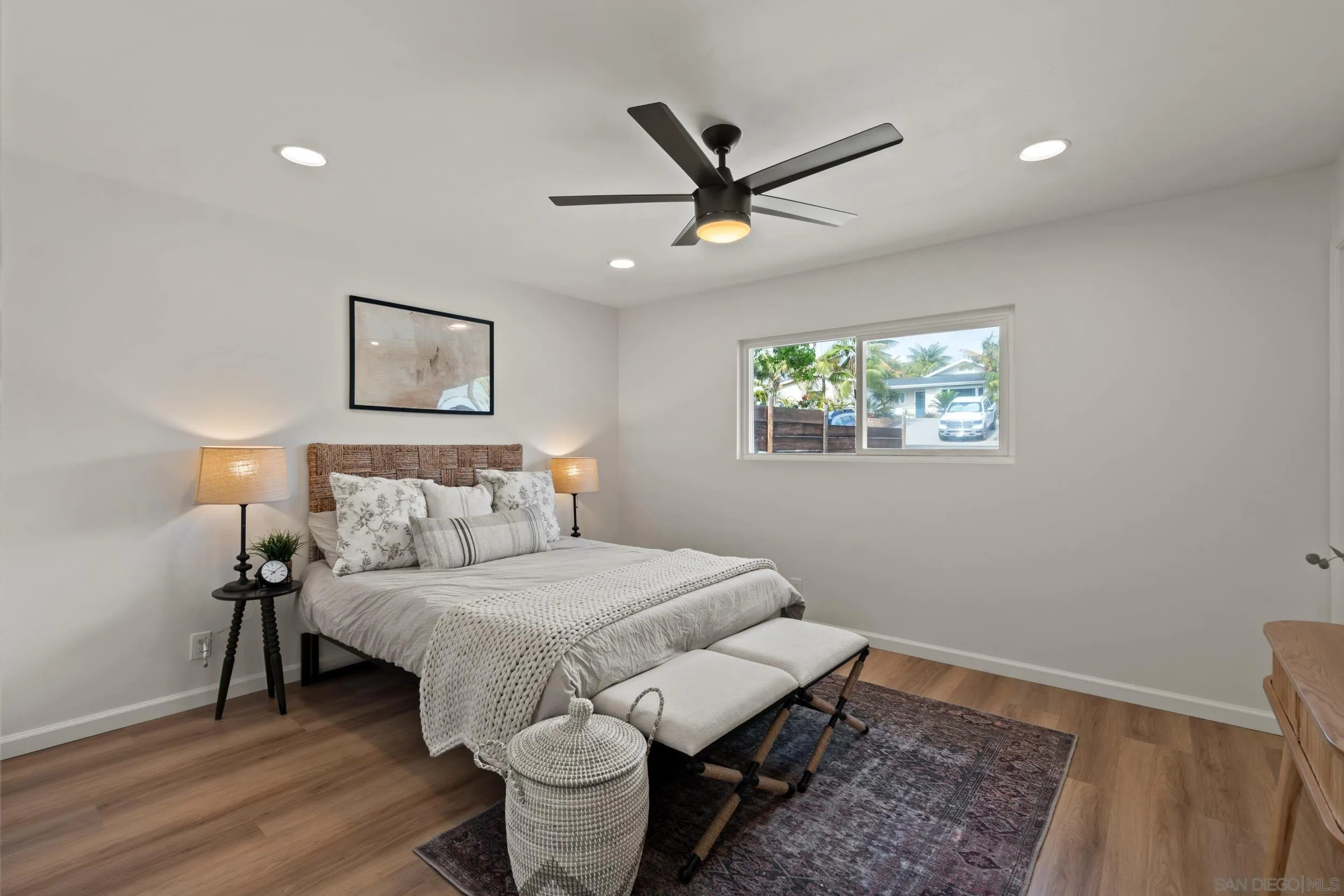 1144 Stratford Drive Encinitas, CA 92024 - Photo 16 of 39 a bedroom with a bed and a window