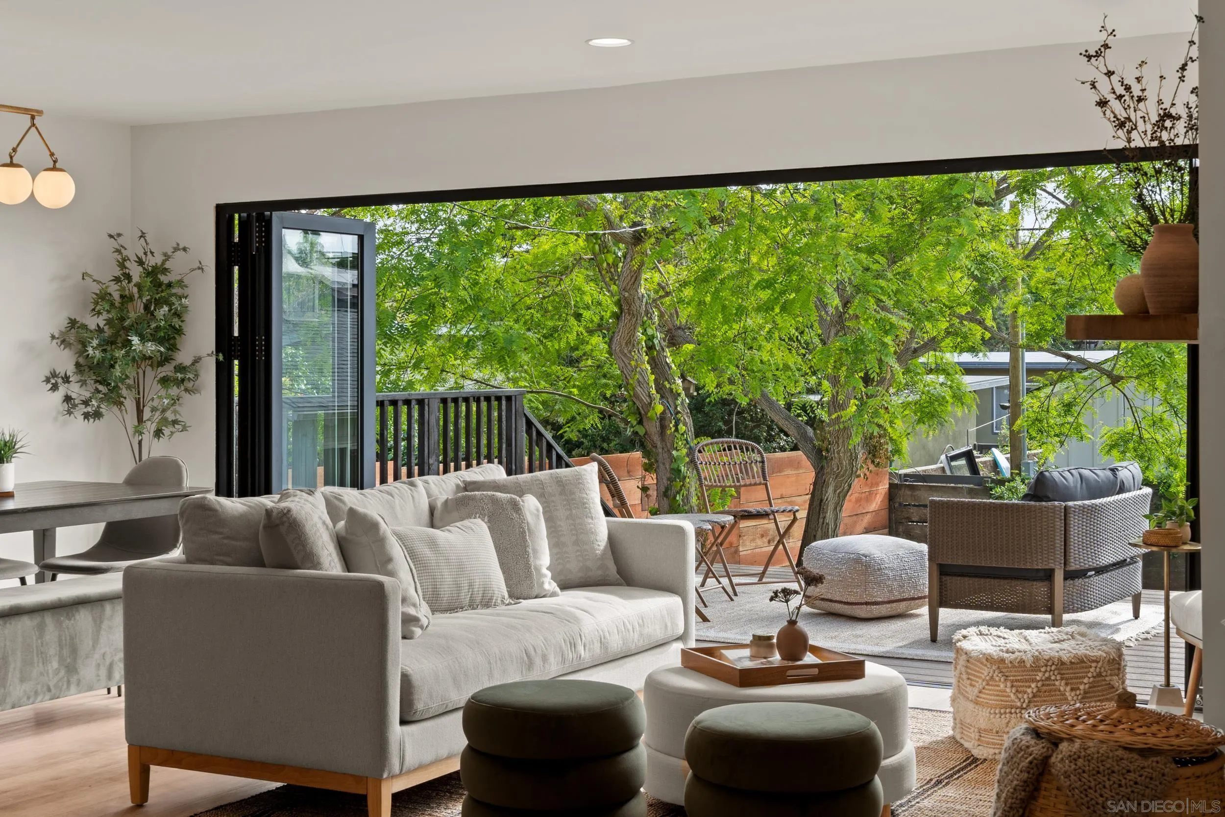 1144 Stratford Drive Encinitas, CA 92024 - Photo 23 of 39 a living room with furniture and a large window