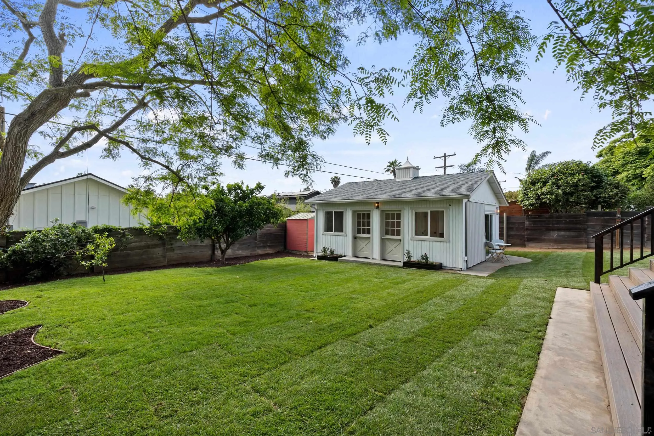 1144 Stratford Drive Encinitas, CA 92024 - Photo 28 of 39 a front view of a house with a garden