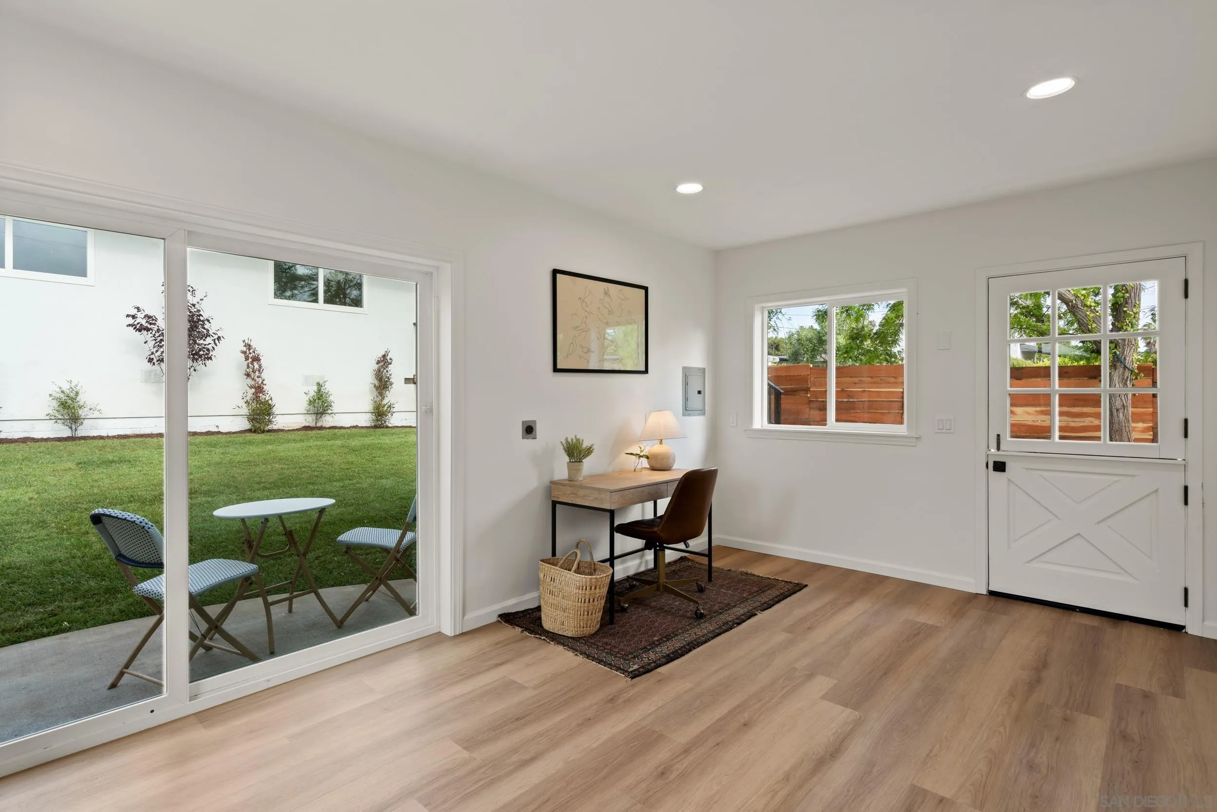 1144 Stratford Drive Encinitas, CA 92024 - Photo 31 of 39 a workspace with wooden floor and a window