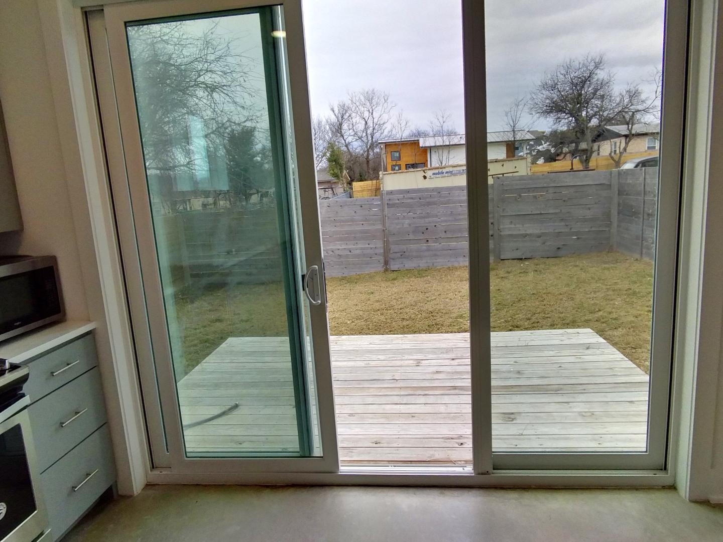 7309 Bennett Avenue, Unit B Austin, TX 78752 - Photo 13 of 16 Doorway to outside with a residential view
