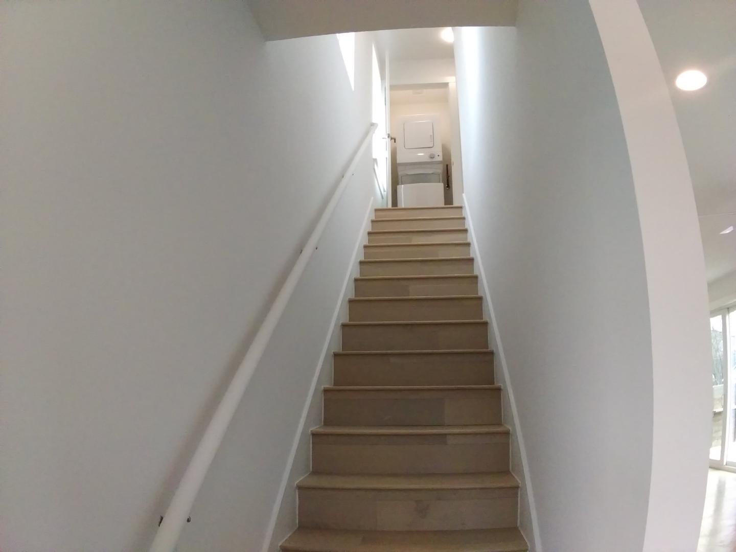 7309 Bennett Avenue, Unit B Austin, TX 78752 - Photo 7 of 16 Stairway featuring recessed lighting