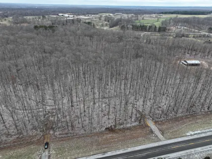 a view of a yard with an ocean