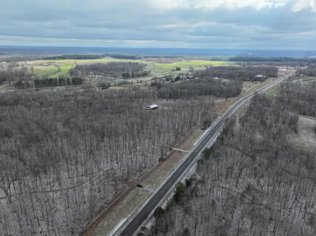 a view of a dry yard with wooden floor