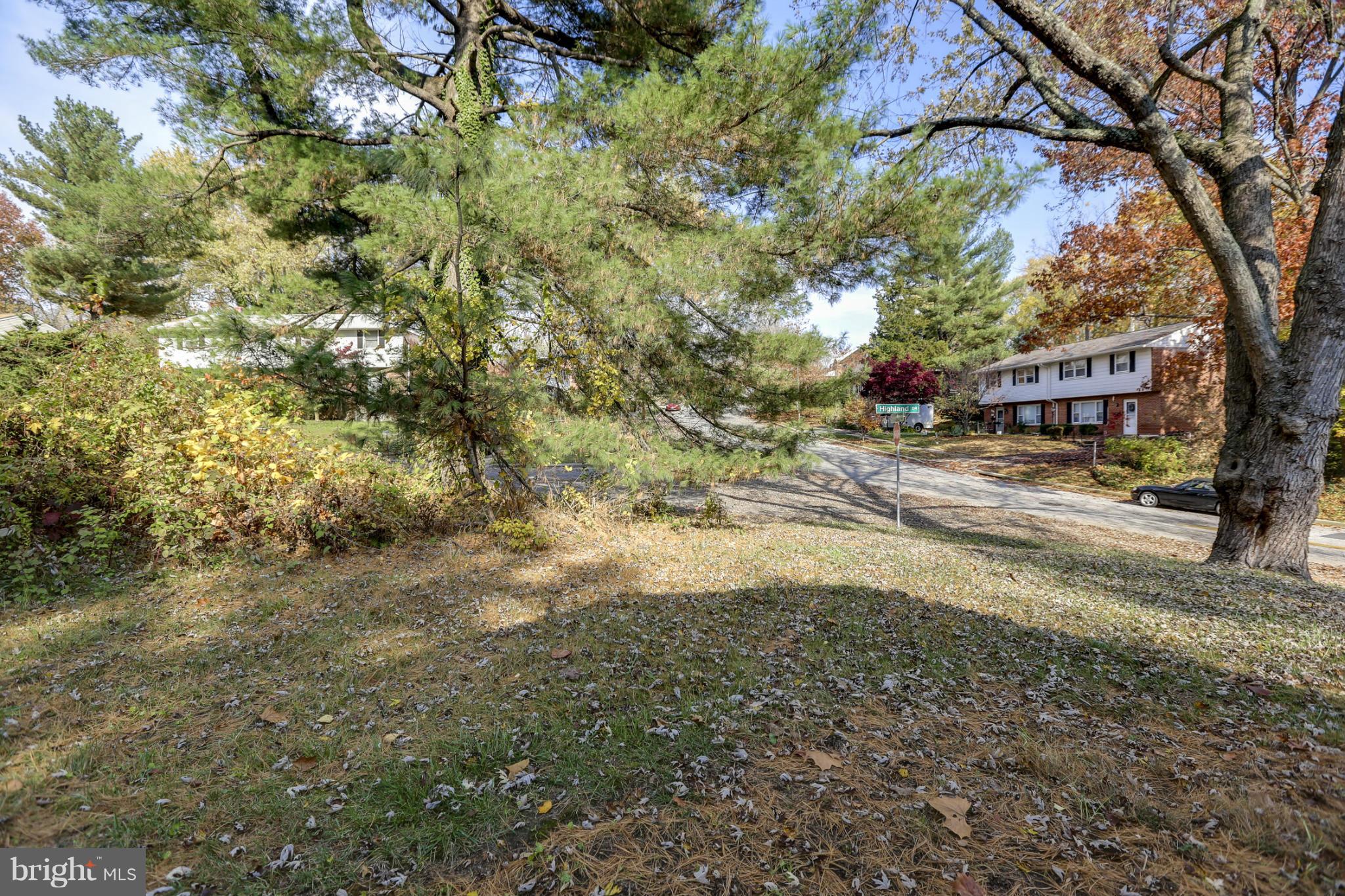 6730 Queens Ferry Road Baltimore, MD 21239 - Photo 21 of 21 a view of road with large trees