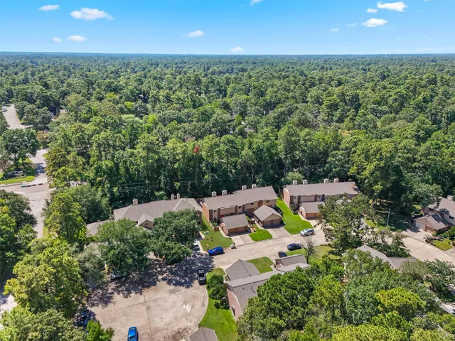 an aerial view of residential house with outdoor space