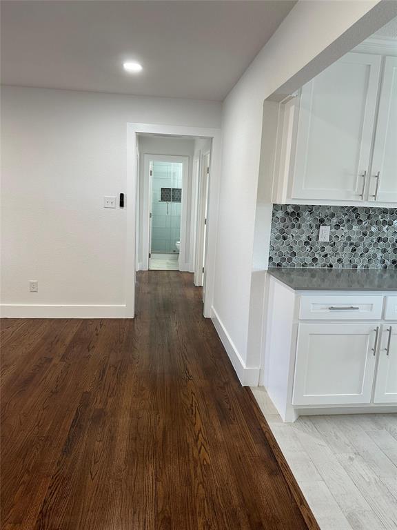 409 Hanbee Street Richardson, TX 75080 - Photo 9 of 18 wooden floor in an empty room and a sink