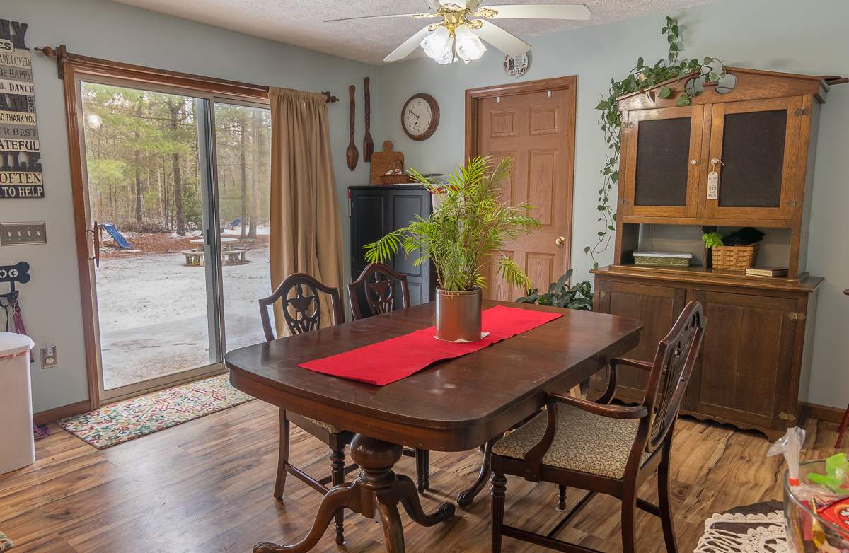 4258 Cold Springs Road Raphine, VA 24472 - Photo 18 of 50 a view of a dining room with furniture and chandelier