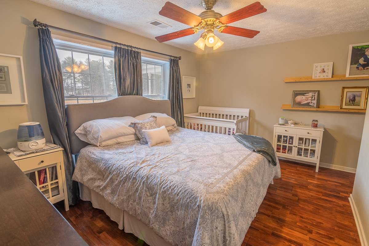 4258 Cold Springs Road Raphine, VA 24472 - Photo 26 of 50 a bedroom with a bed furniture and a large window