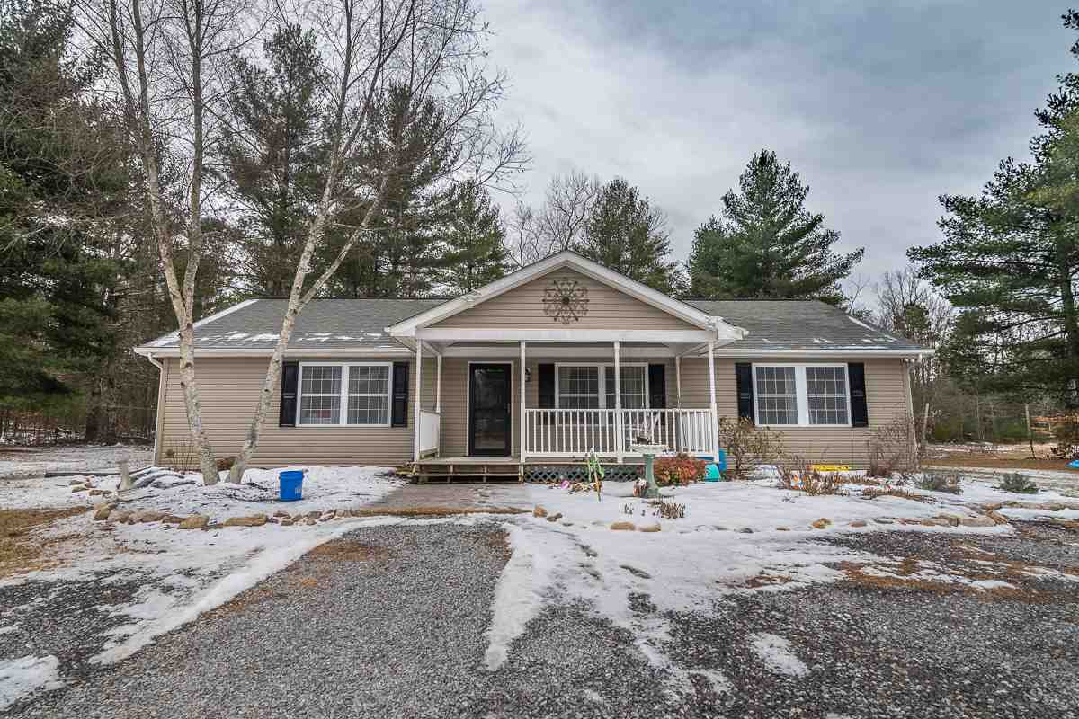 4258 Cold Springs Road Raphine, VA 24472 - Photo 4 of 50 a front view of a house with a yard covered in snow