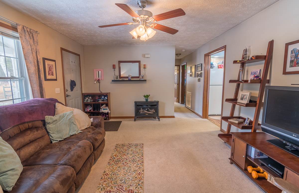 4258 Cold Springs Road Raphine, VA 24472 - Photo 8 of 50 a living room with furniture a air conditioner and a window