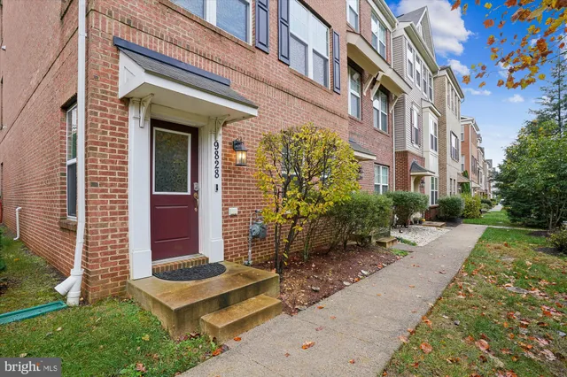 a view of a building with a yard