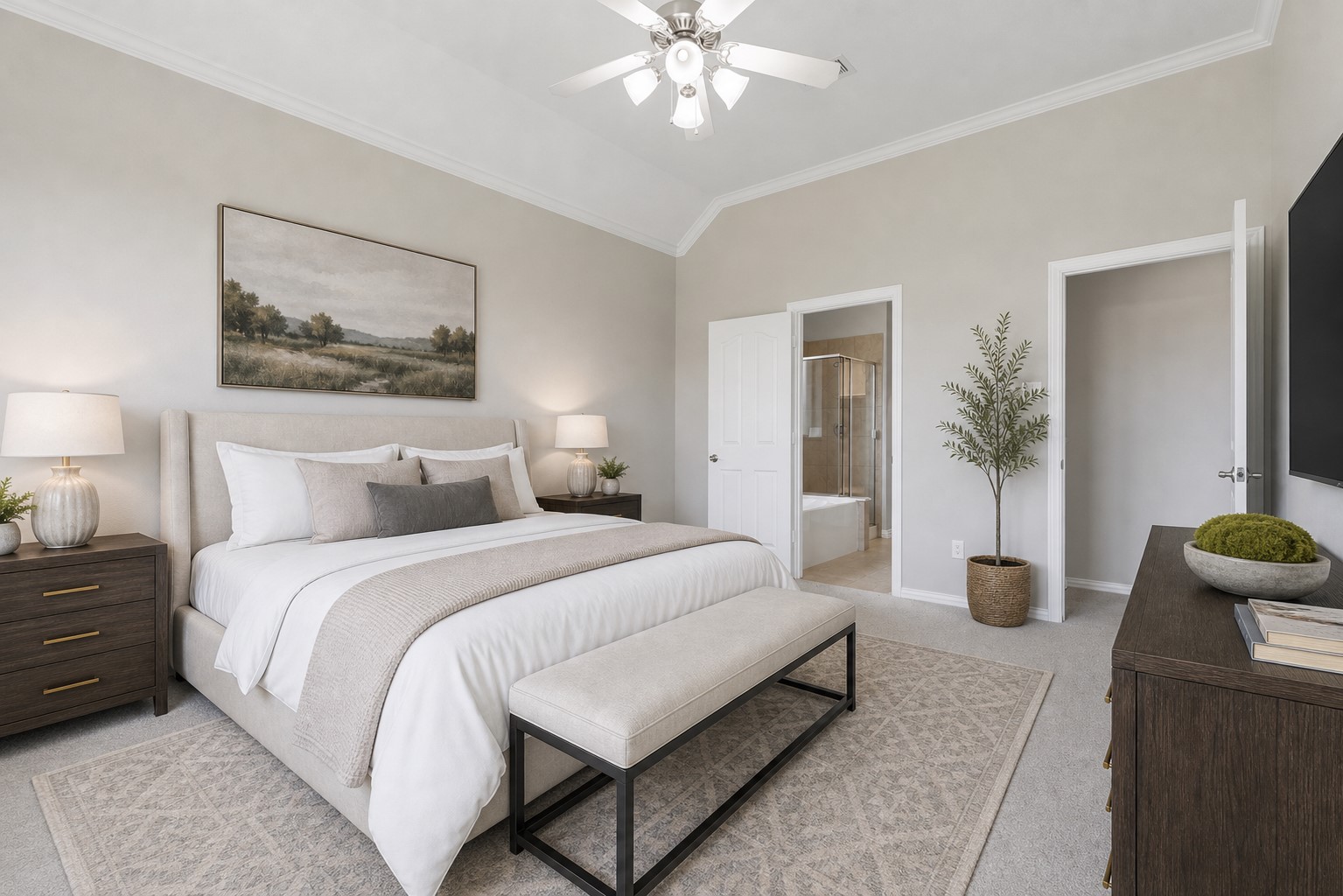 25926 Morgan Springs Spring, TX 77373 - Photo 20 of 49 Another view of the generously sized primary suite highlights its elegant, vaulted ceiling trimmed with crown molding and private location, while offering direct access to the luxurious ensuite bath and spacious walk-in closet. **Photo is Virtually Staged**