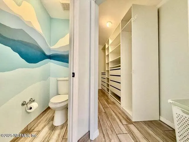 a view of swimming pool with furniture