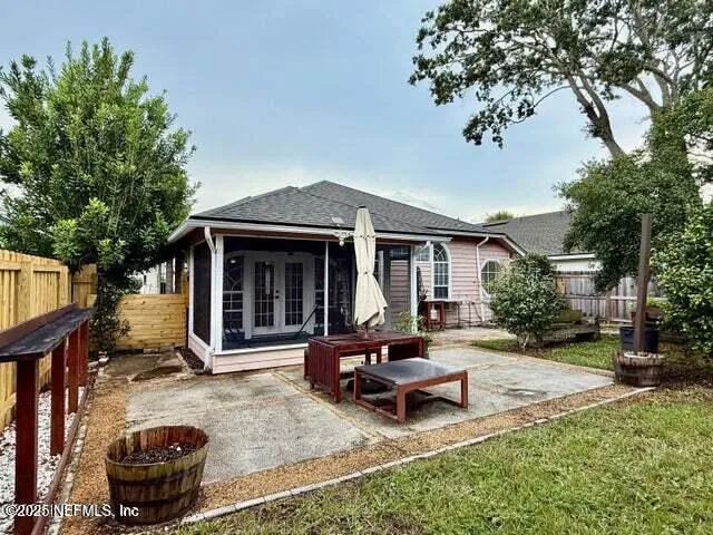 a view of a backyard with a patio