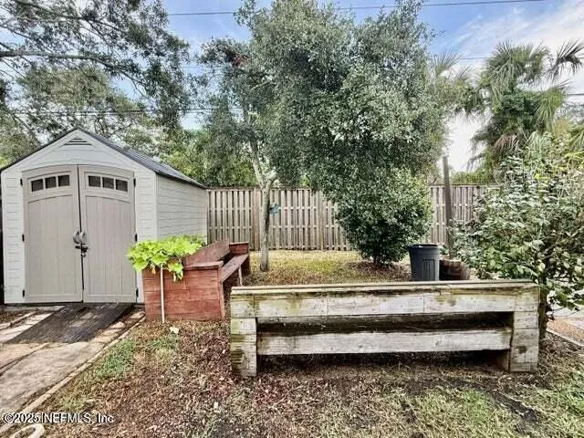 a view of a kitchen with a sink