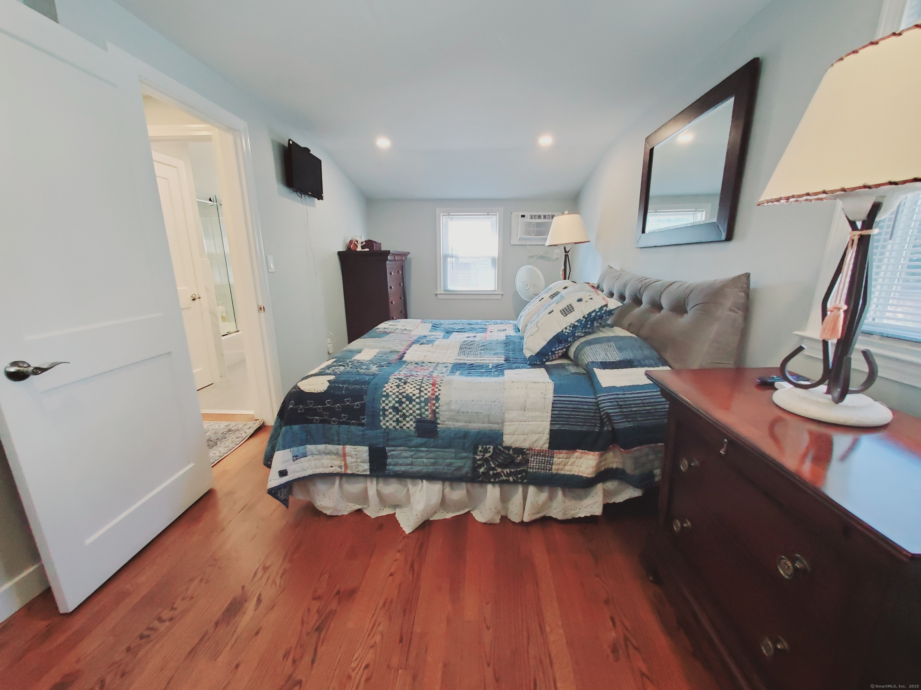 27 Winter Street Stamford, CT 06905 - Photo 11 of 17 a living room with furniture and a wooden floor