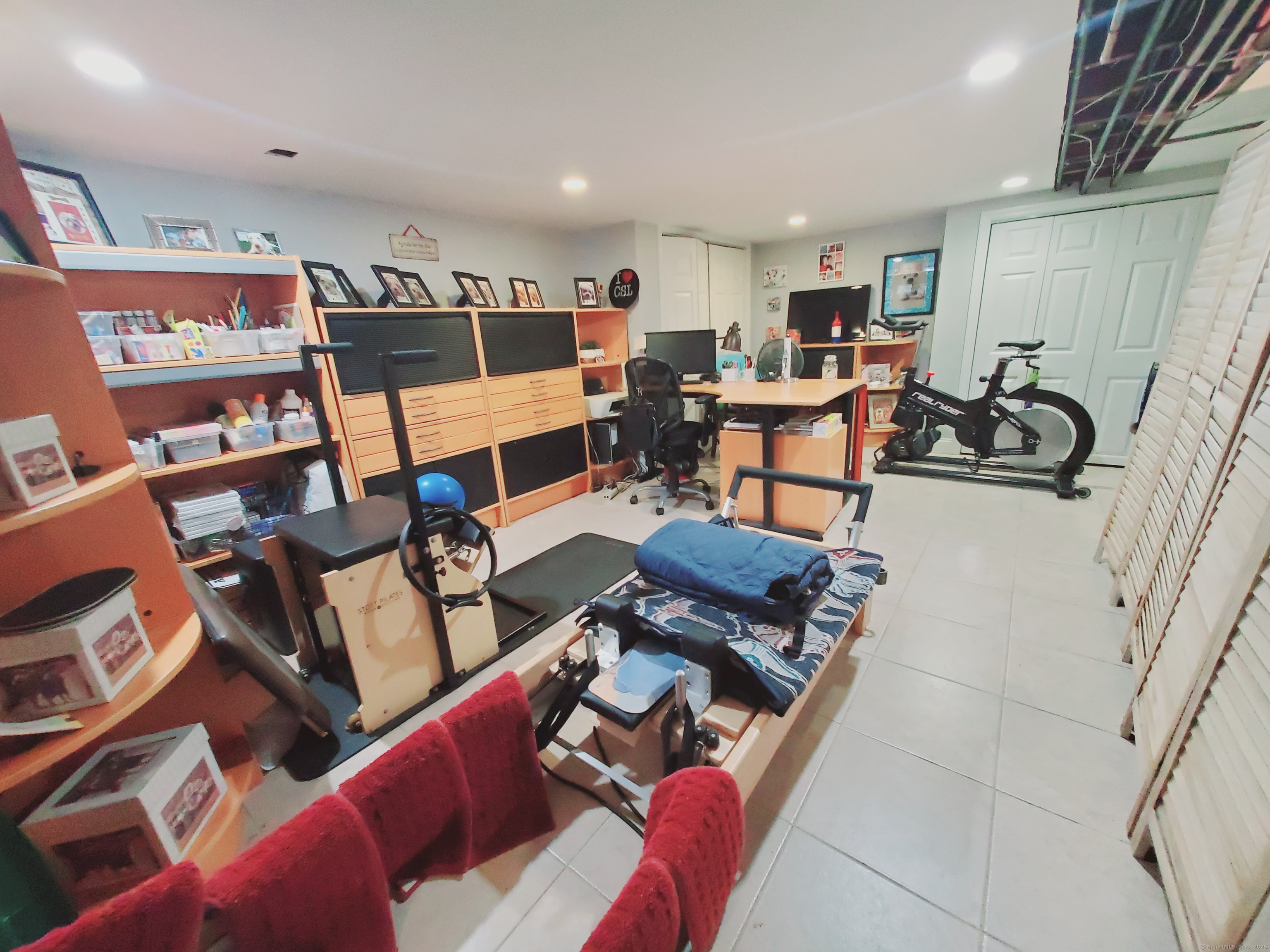 27 Winter Street Stamford, CT 06905 - Photo 15 of 17 a living room with furniture a air conditioner and a table