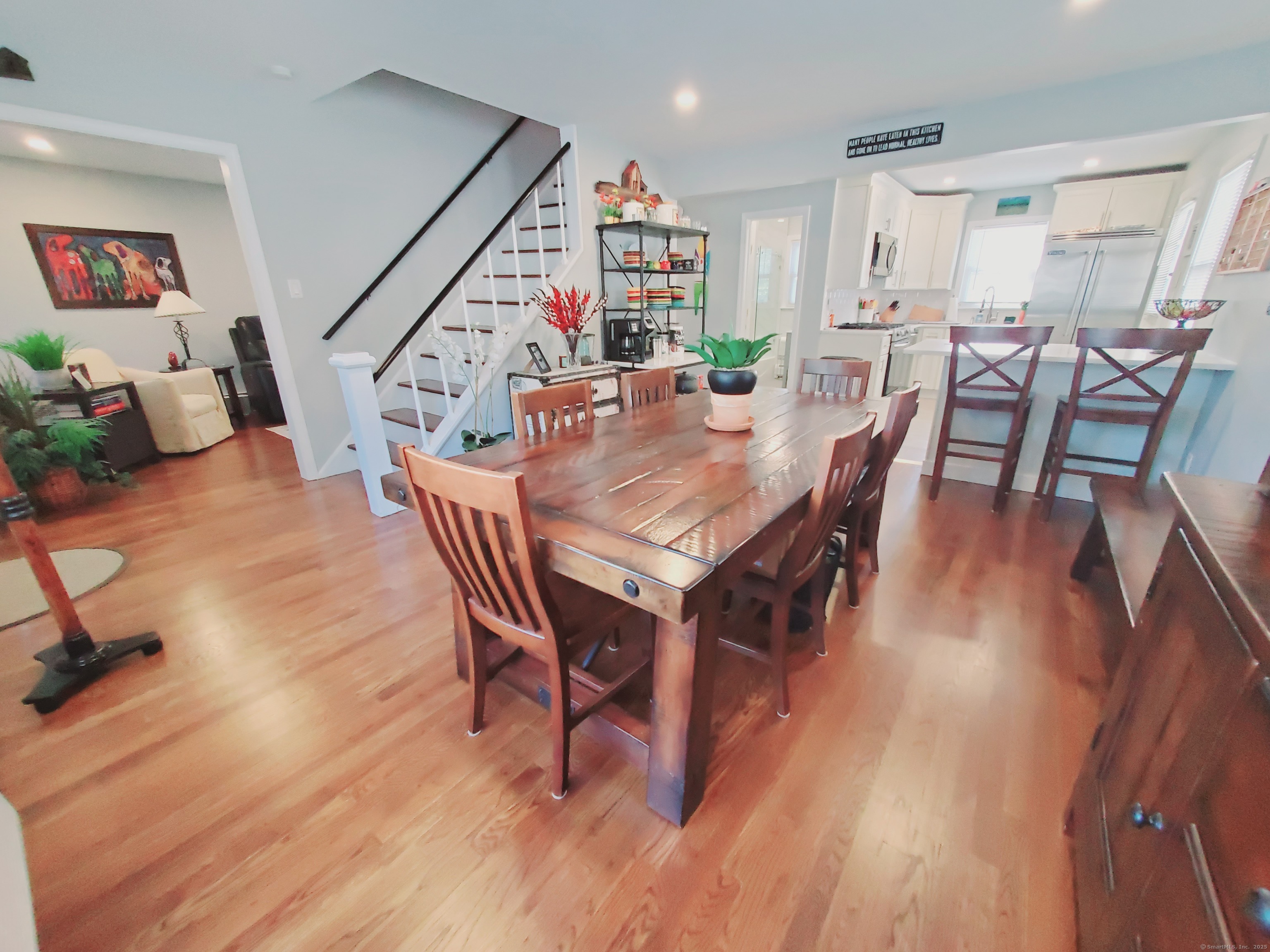 27 Winter Street Stamford, CT 06905 - Photo 5 of 17 a view of a dining room with furniture and wooden floor