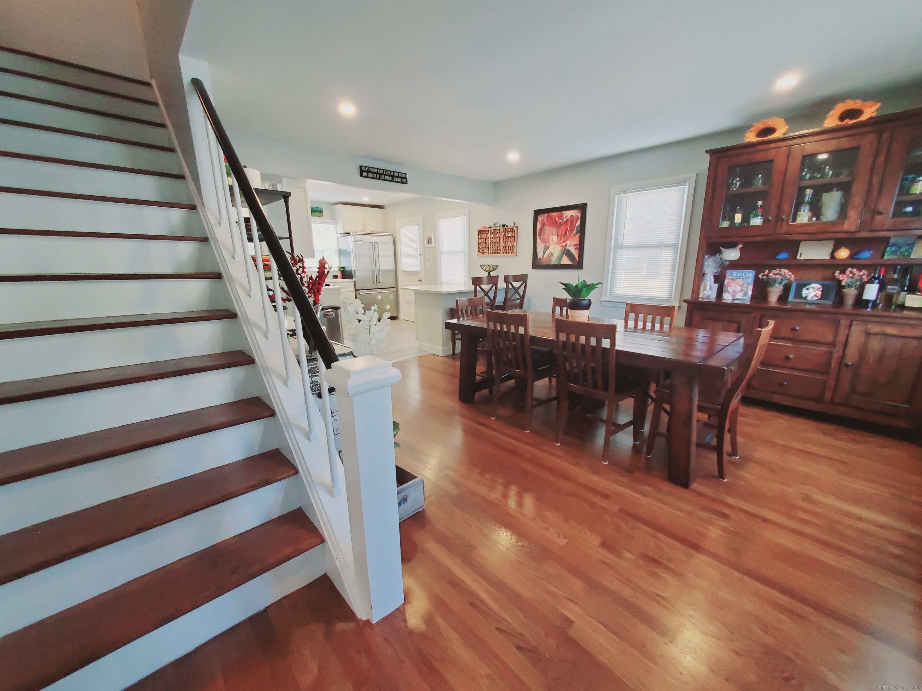 27 Winter Street Stamford, CT 06905 - Photo 6 of 17 a view of a livingroom with furniture and wooden floor
