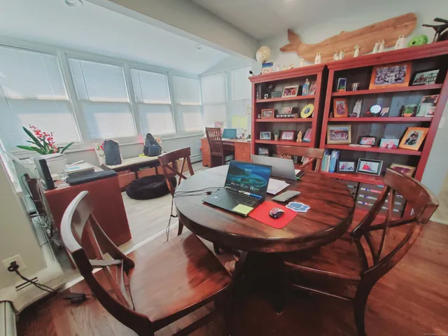 a view of a dining room with furniture