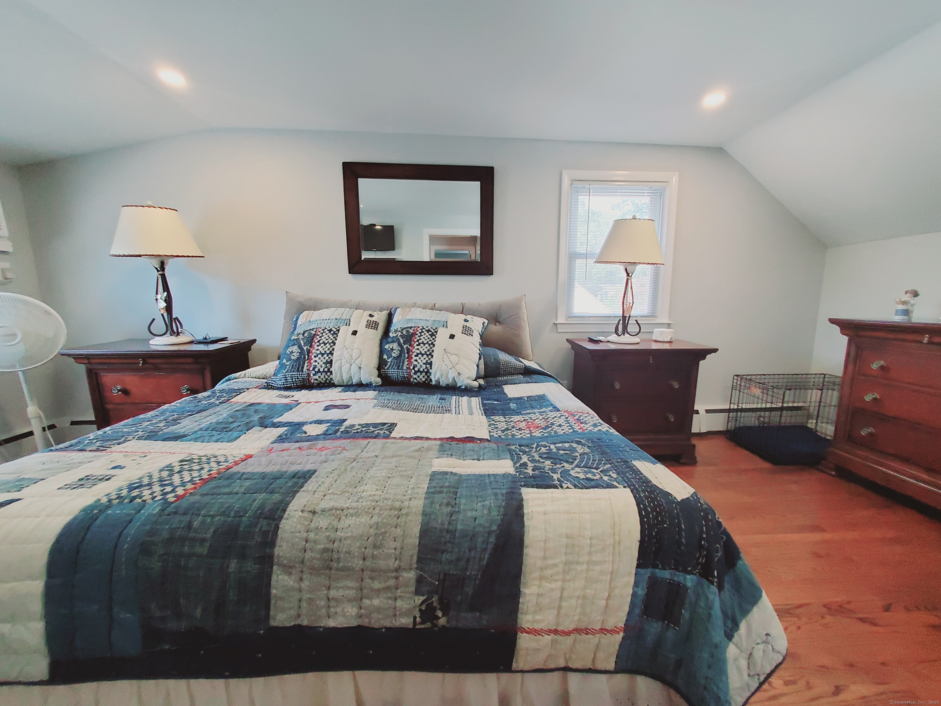 27 Winter Street Stamford, CT 06905 - Photo 10 of 17 a bedroom with bed and a night stand