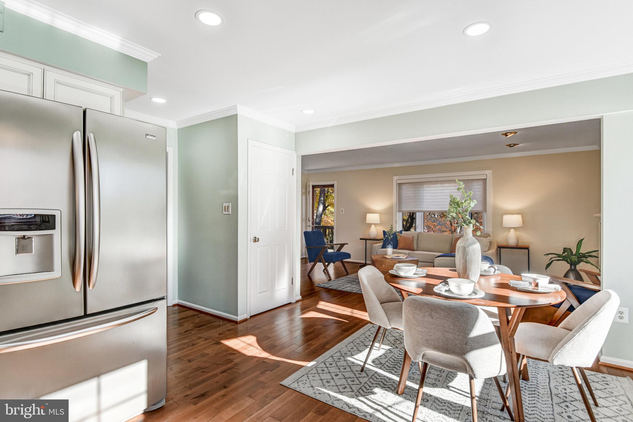 8420 Sweet Pine Court Springfield, VA 22153 - Photo 14 of 45 a view of a dining room with furniture
