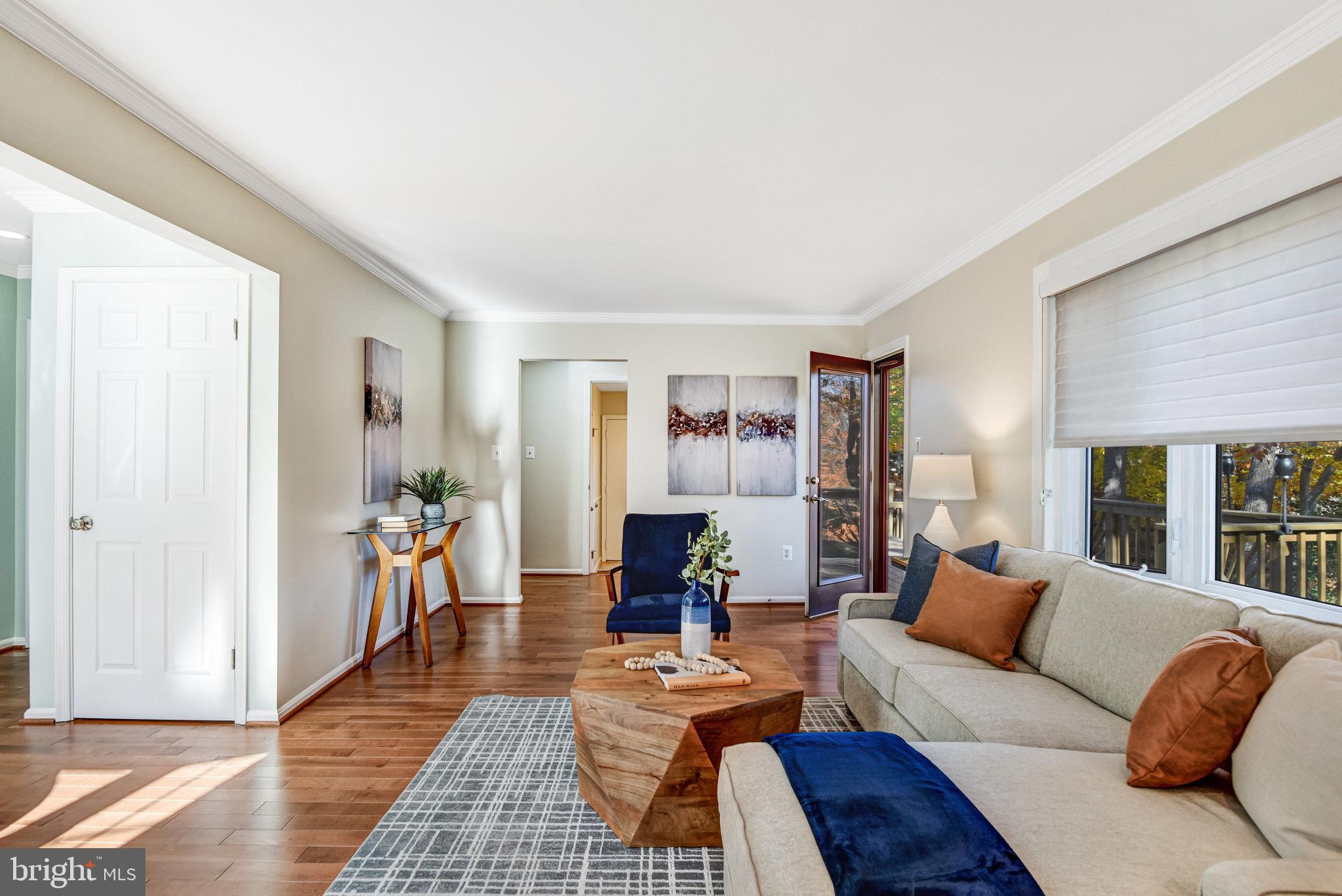 8420 Sweet Pine Court Springfield, VA 22153 - Photo 18 of 45 a living room with furniture and wooden floor