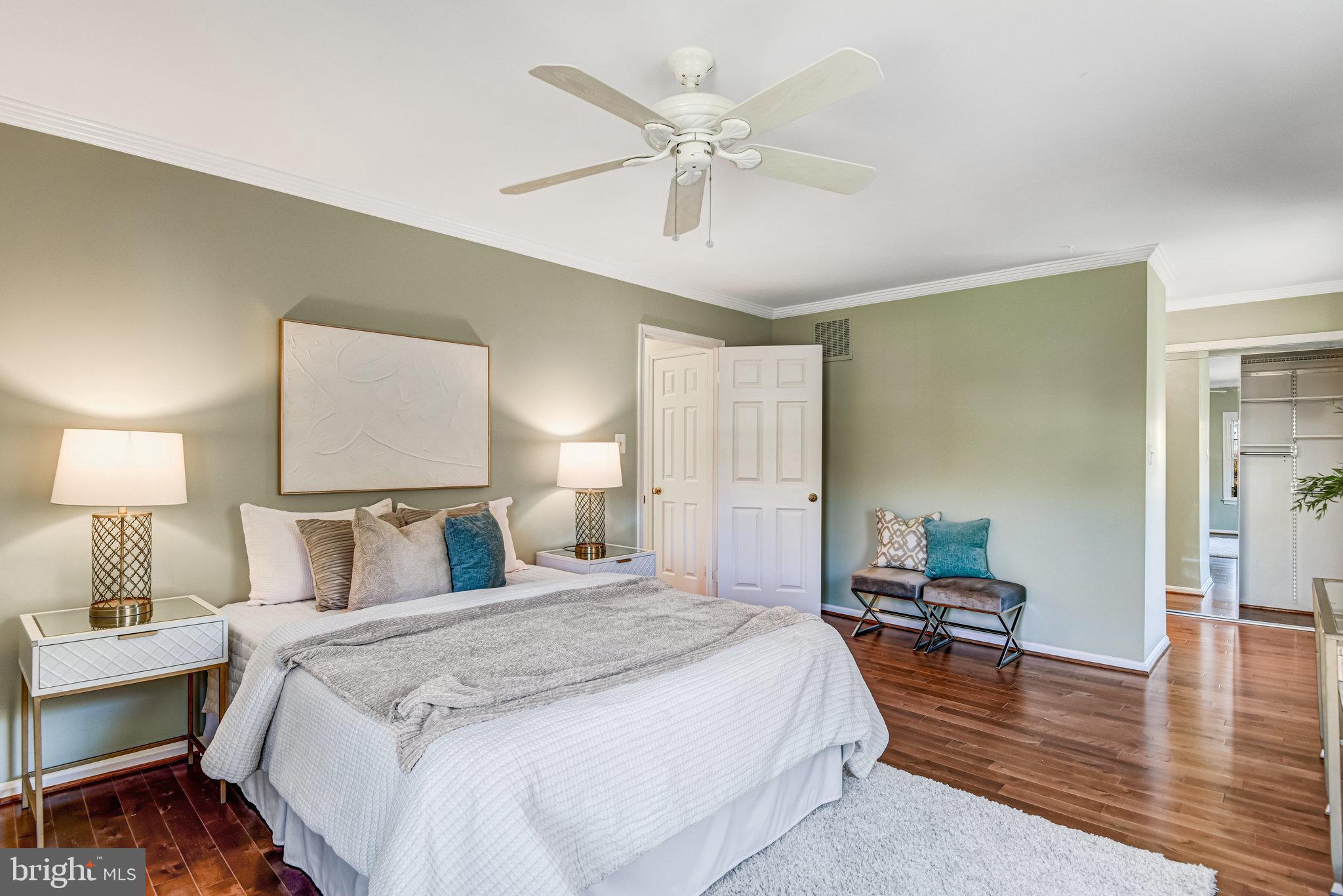 8420 Sweet Pine Court Springfield, VA 22153 - Photo 25 of 45 a bedroom with a bed and a table