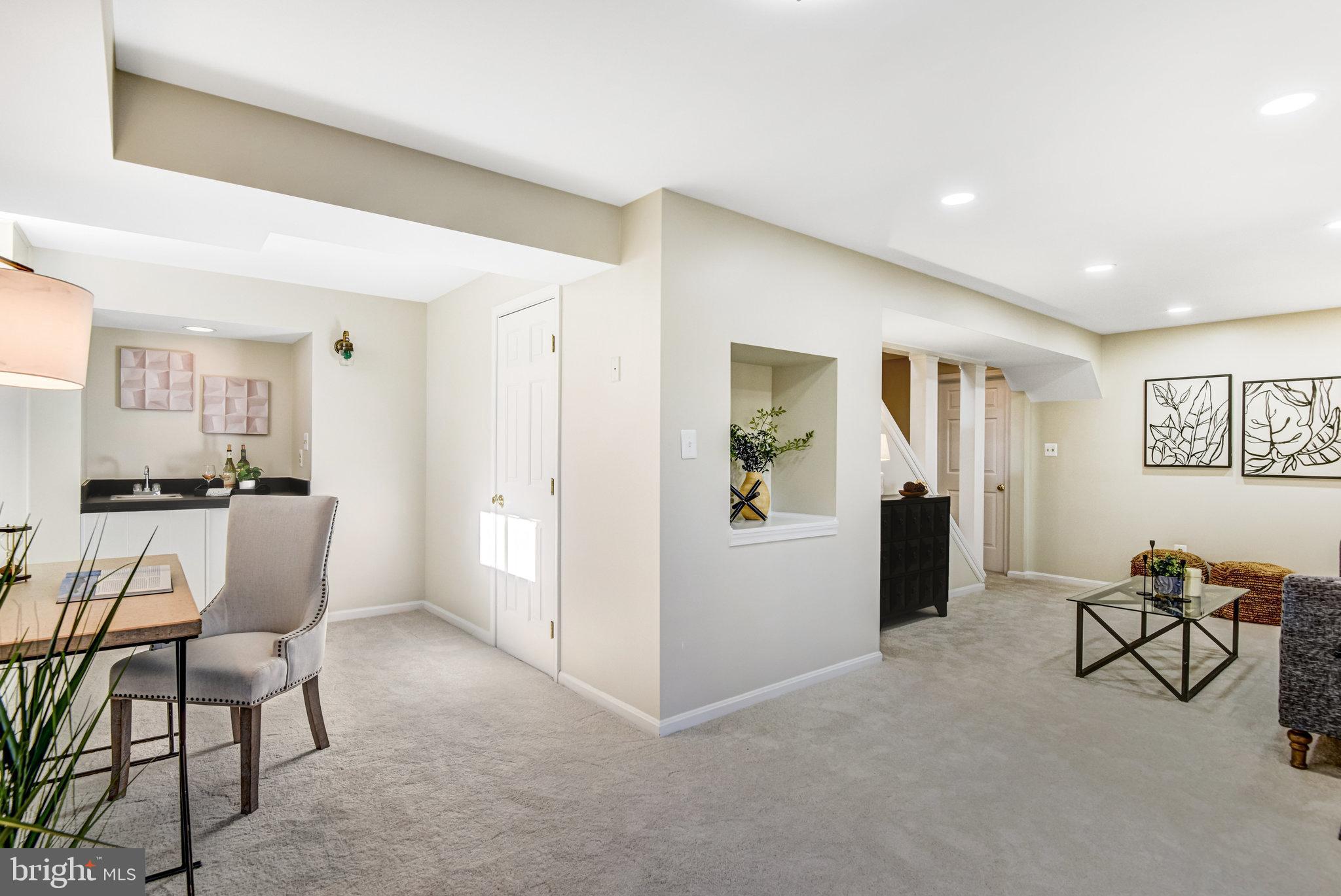 8420 Sweet Pine Court Springfield, VA 22153 - Photo 32 of 45 a view of a livingroom with furniture and a window