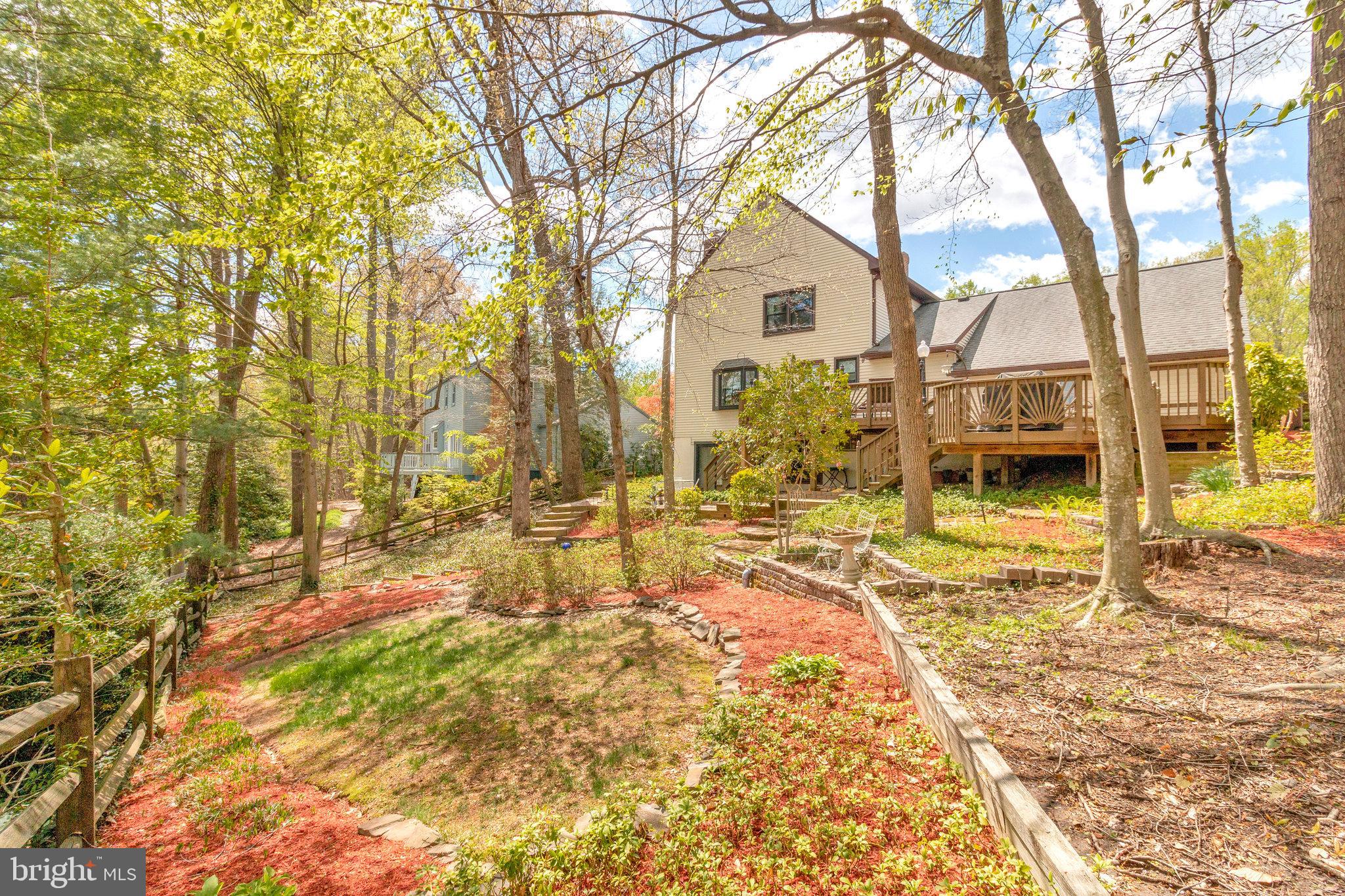 8420 Sweet Pine Court Springfield, VA 22153 - Photo 44 of 45 a view of house with yard and sitting area