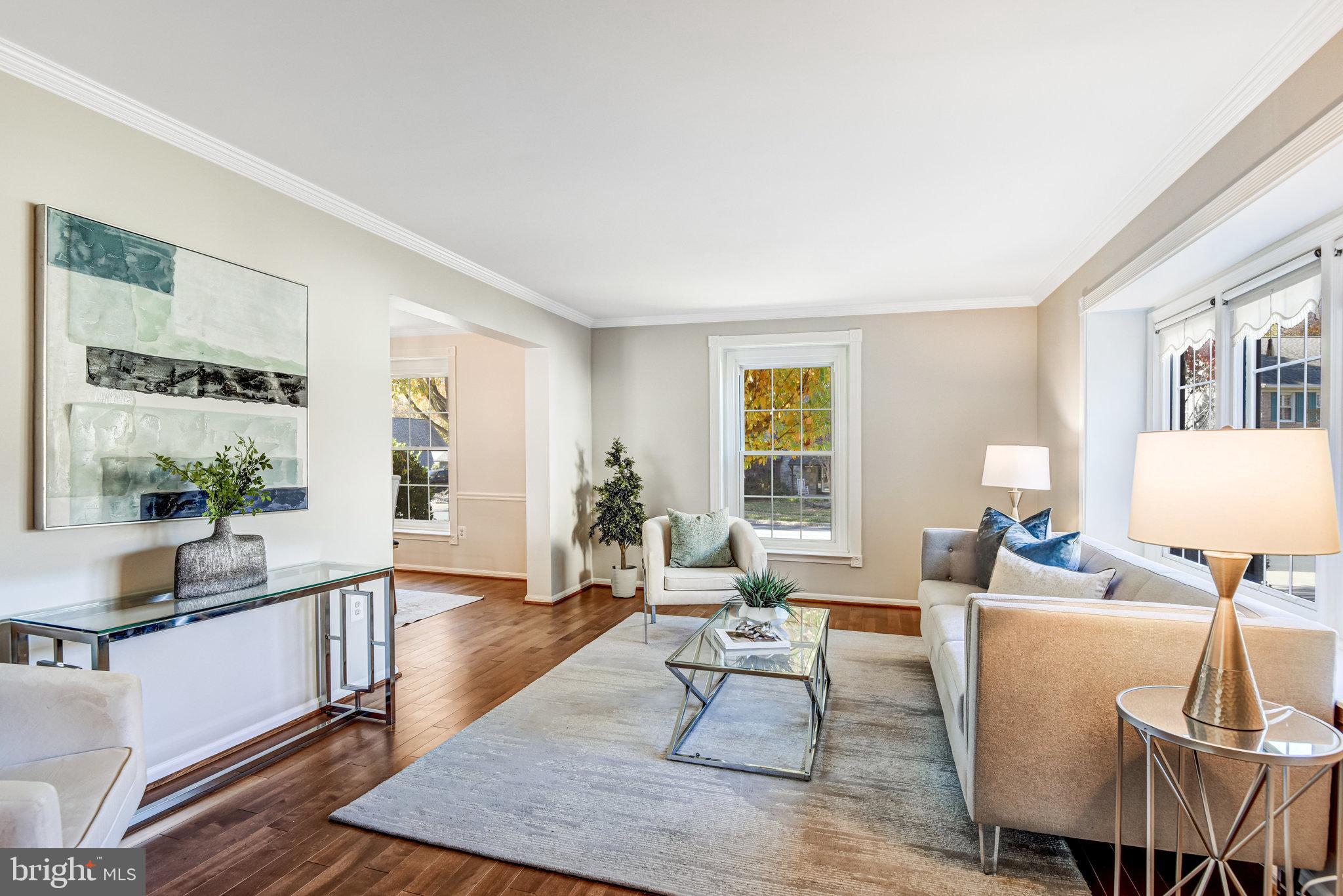 8420 Sweet Pine Court Springfield, VA 22153 - Photo 6 of 45 a living room with furniture and a table