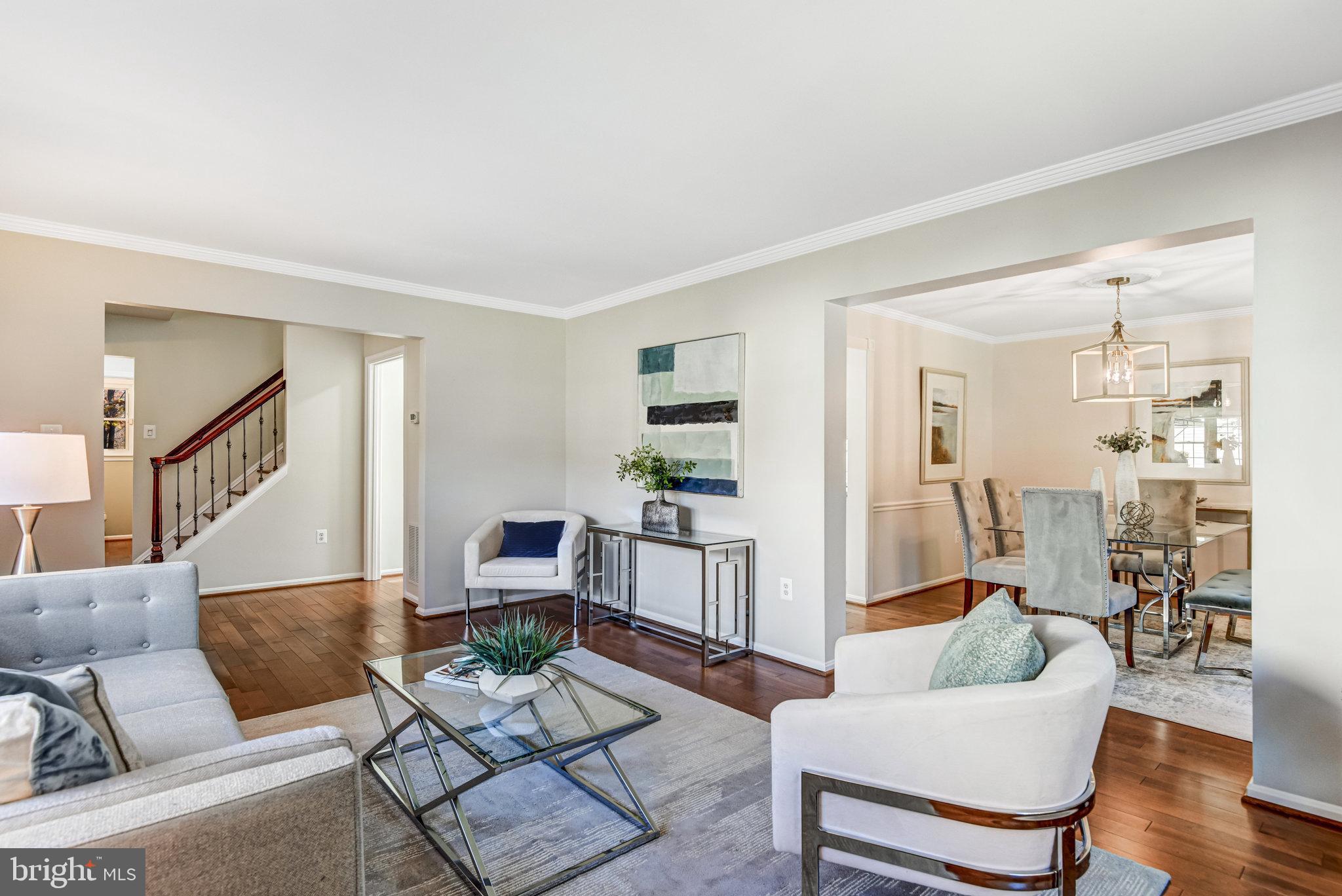 8420 Sweet Pine Court Springfield, VA 22153 - Photo 7 of 45 a living room with furniture and wooden floor