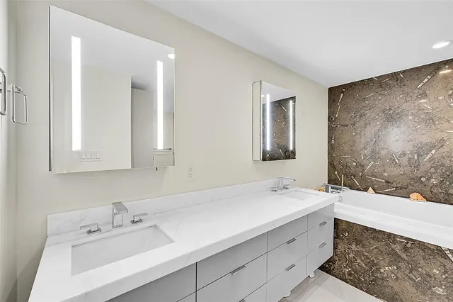 a view of a city from a balcony with city view