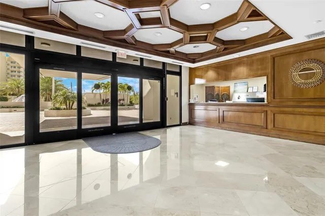 a view of ocean with a multi story building