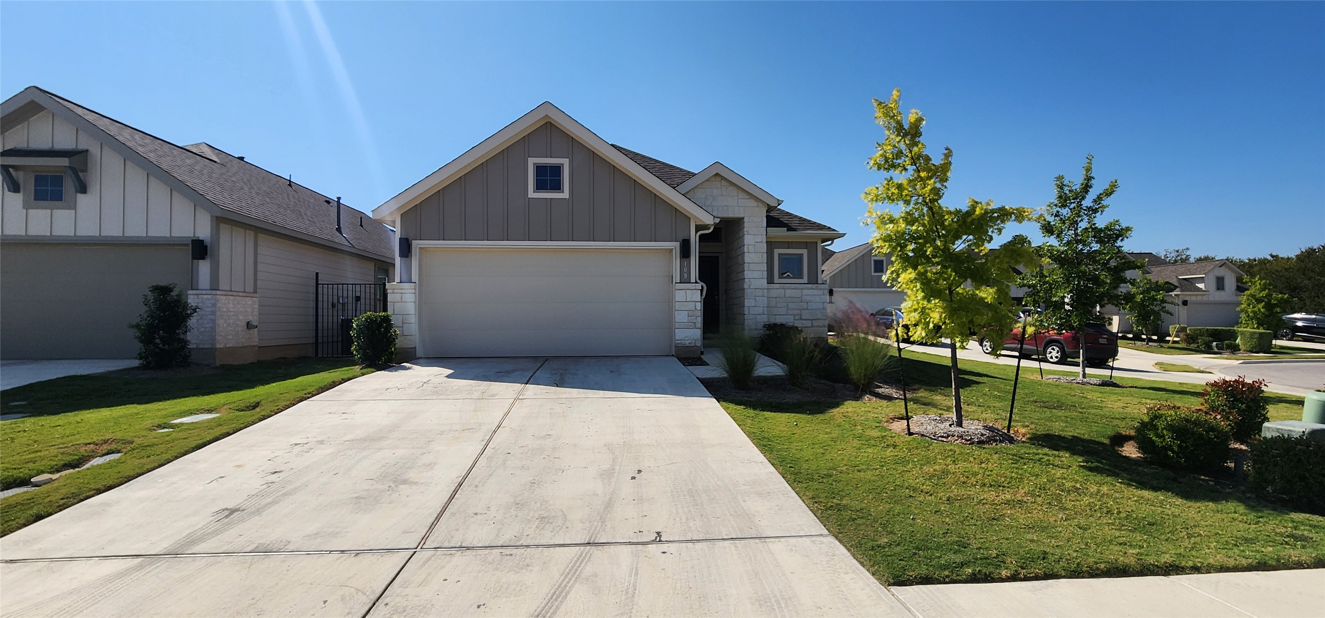 a front view of house with a yard