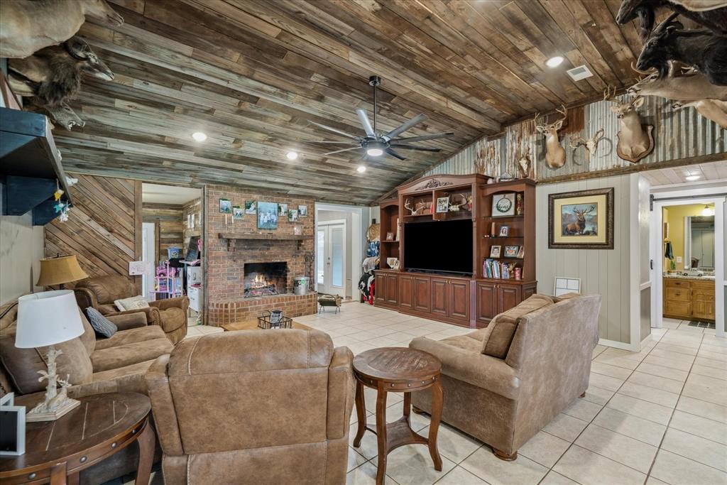 350 Alaska Street Van, TX 75790 - Photo 13 of 37 a living room with furniture and a flat screen tv