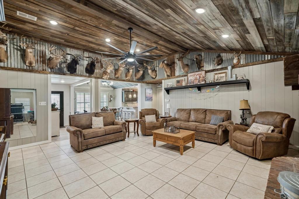 350 Alaska Street Van, TX 75790 - Photo 14 of 37 a living room with furniture and a chandelier