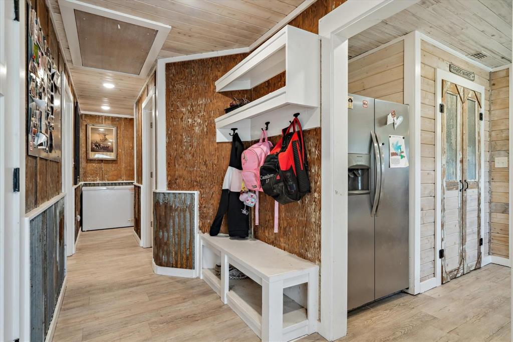 350 Alaska Street Van, TX 75790 - Photo 16 of 37 a view of walk in closet with clothes and shoes