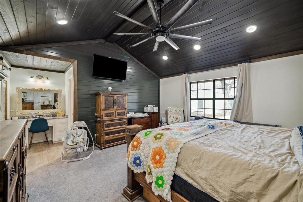 350 Alaska Street Van, TX 75790 - Photo 22 of 37 a bedroom with a bed window and a flat screen tv