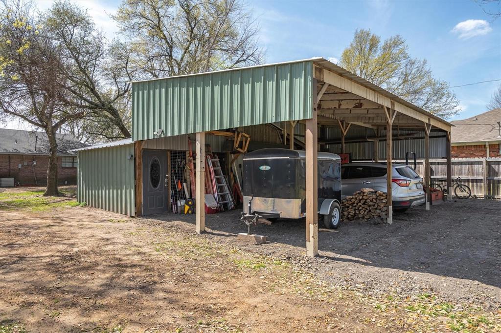 350 Alaska Street Van, TX 75790 - Photo 31 of 37 a view of a chair and tables in the patio
