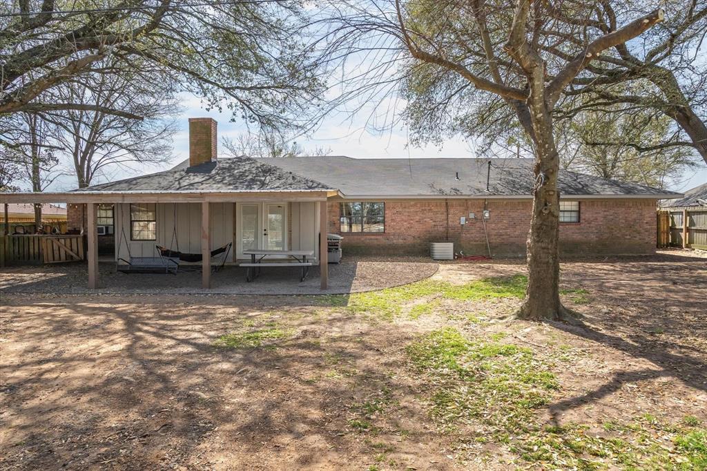 350 Alaska Street Van, TX 75790 - Photo 32 of 37 a view of a house with a yard