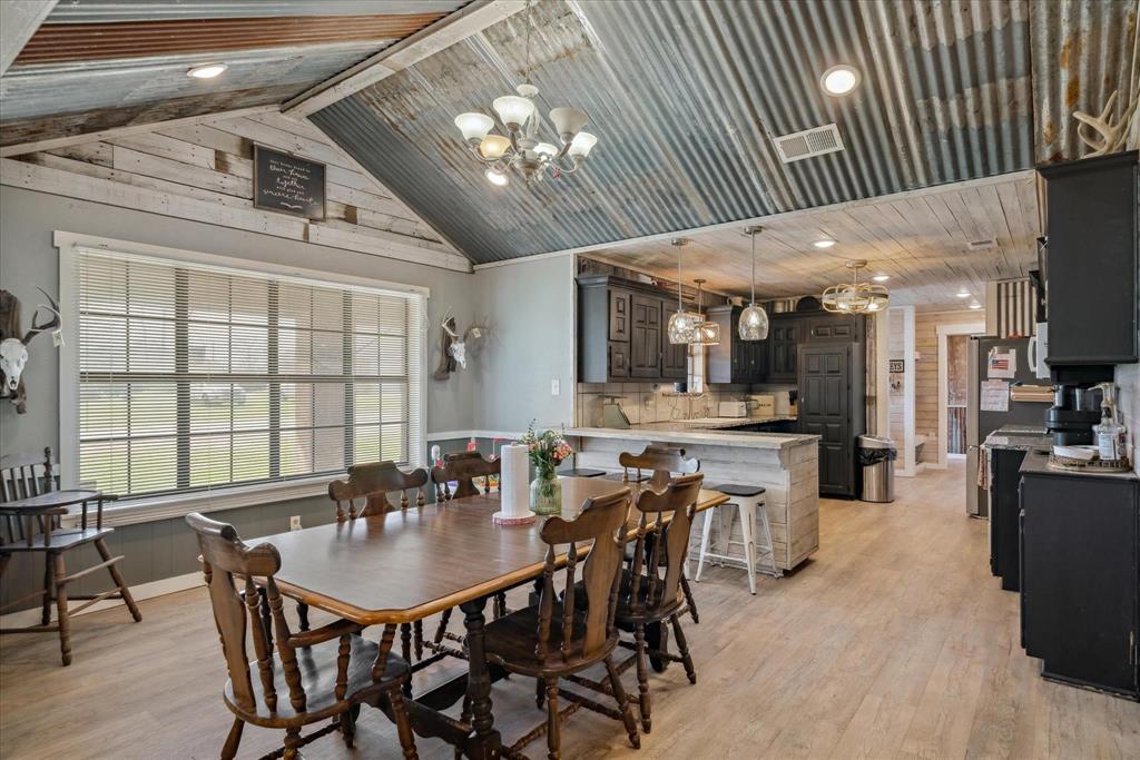 350 Alaska Street Van, TX 75790 - Photo 9 of 37 a view of a dining room with furniture and chandelier