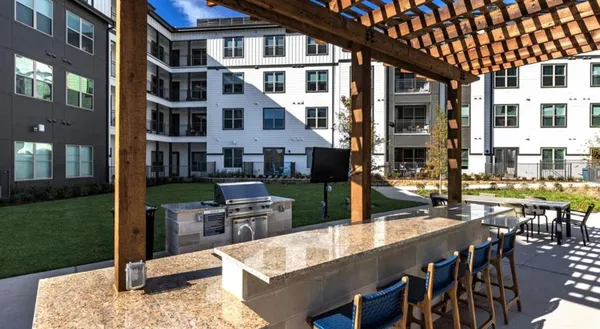 a view of outdoor space yard deck patio and fire pit