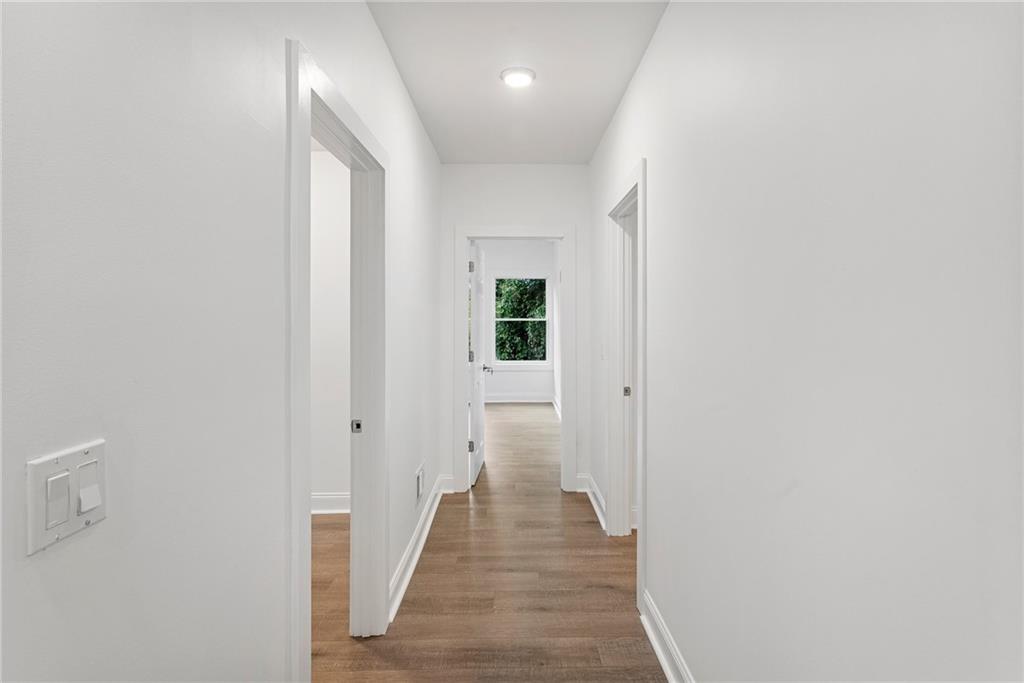 875 Dickson Road Sewickley, PA 15143 - Photo 13 of 29 a view of a hallway with wooden floor and closet