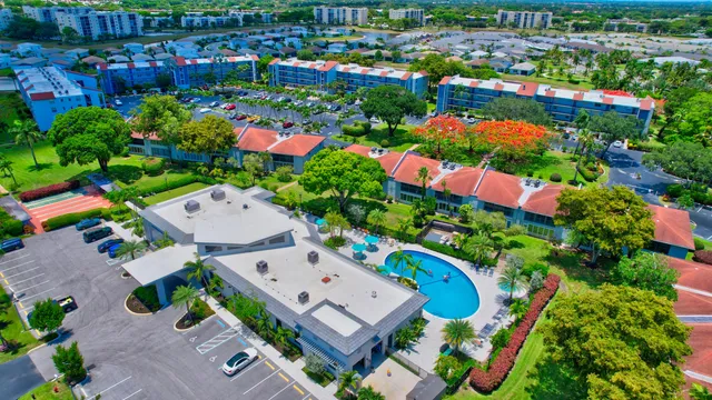 a view of house with outdoor space and garden