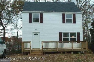 a front view of a house with a porch