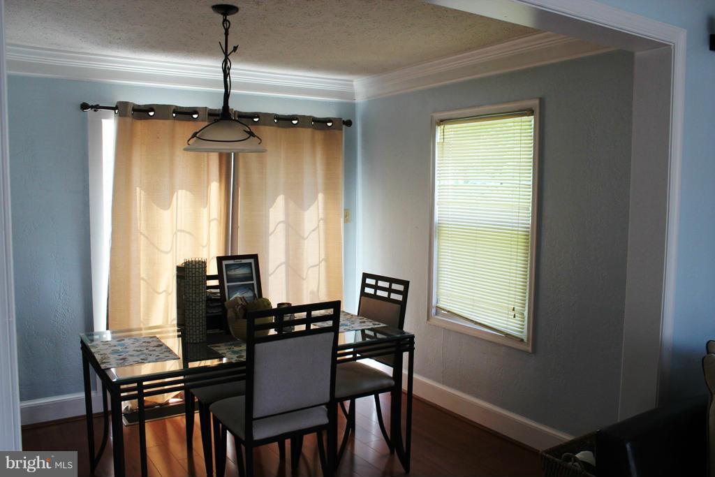 46695 Yorktown Road Lexington Park, MD 20653 - Photo 4 of 14 a view of a dining room with furniture and window